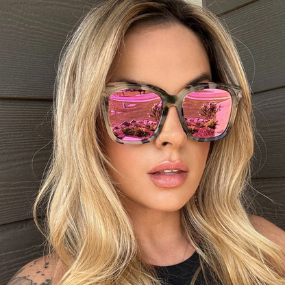 UGC - customer content - blonde female wearing diff eyewear bella sunglasses with a cream tortoise frame and pink mirror lenses