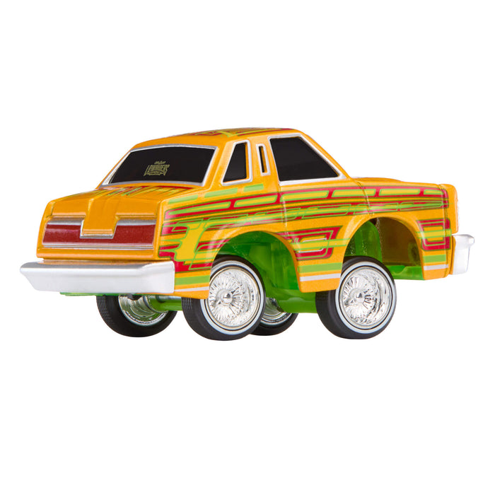 Colorful toy car with a unique design on a white background