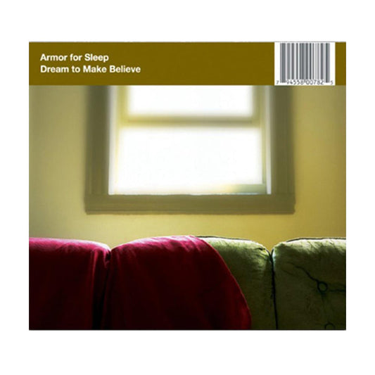 Dream To Make Believe album cover by Armor For Sleep shows a green couch draped with a red blanket in front of a sunlit window. The album and brand name appear at the top left. Released on Equal Vision Records.
