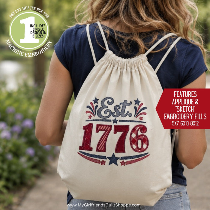 Person wearing a drawstring bag with 'Est. 1776' design, outdoors.