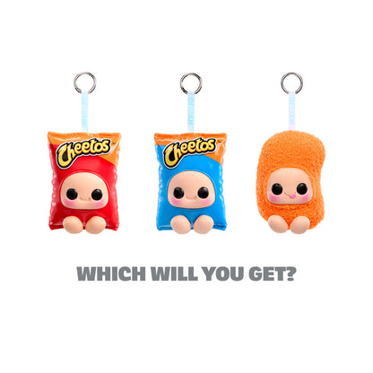 Three cartoon-style character keychains with different faces on a white background