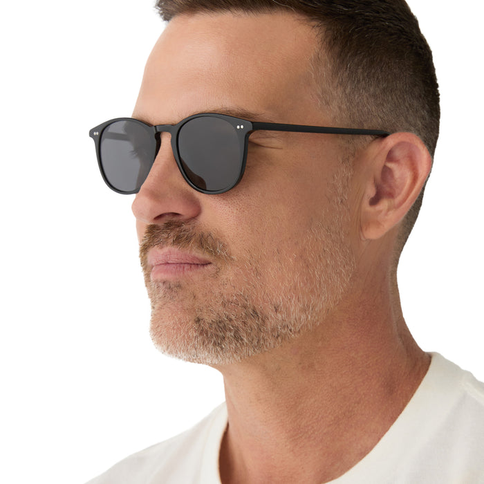 on model - male wearing diff eyewear jaxson xl square prescription glasses with a black smoke crystal acetate frame angled view
