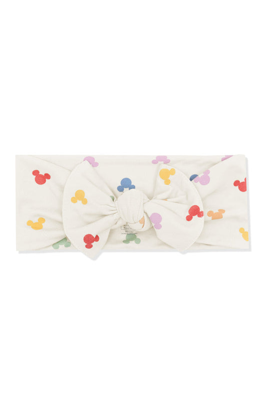 Knotted Bow with Pastel Mickey Mouse pattern on an oat background
