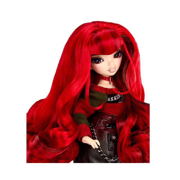 A doll with very long, vibrant red hair, wearing a red knit sweater, leather skirt with a black chain, set against a plain white background