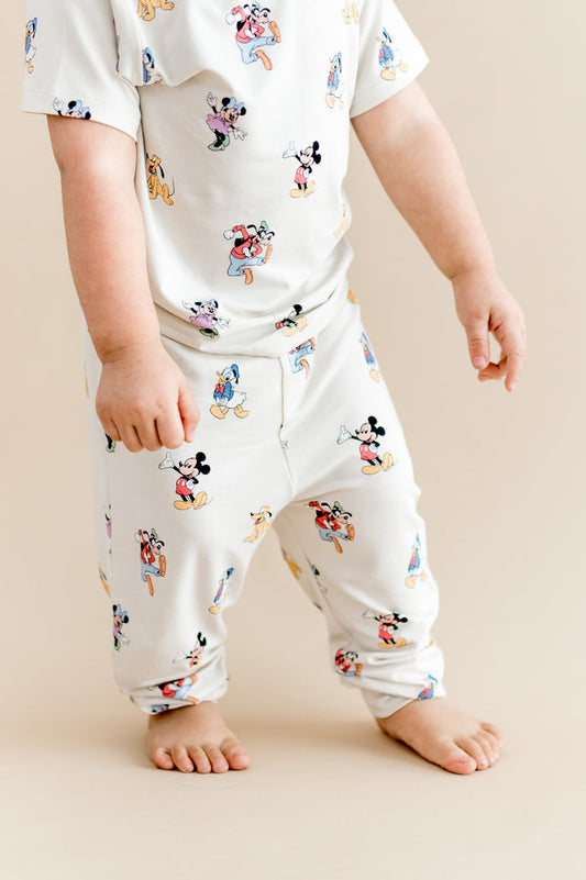 Young toddler wearing mickey and friends printed pant and matching tshirt