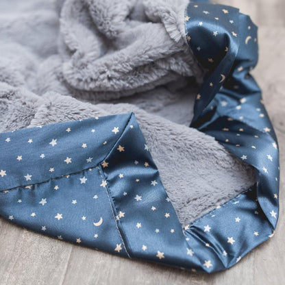 A plush and silky gray receiving blanket with a snuggly satin star-patterned back, perfect for wrapping up your little ones.