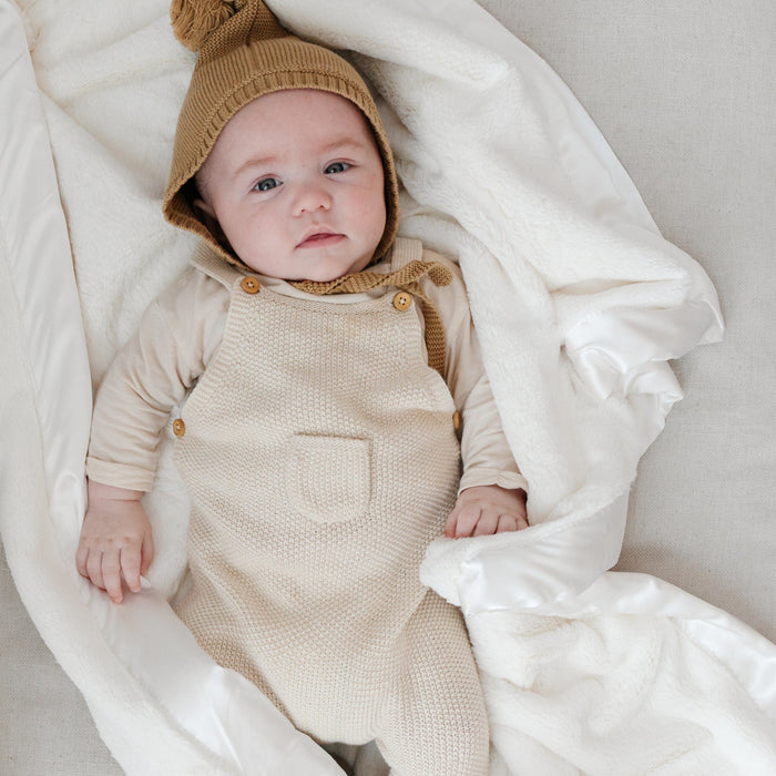 Soft and cozy receiving blanket, perfect for wrapping your baby in gentle warmth.