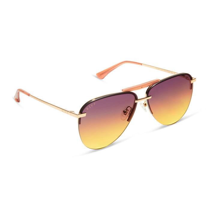 diff eyewear featuring the tahoe aviator sunglasses with a gold frame and inca gradient lenses angled view