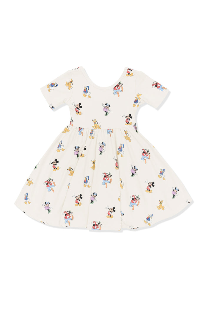 Twirl Dress with Mickey Mouse and Friends print on an oat background