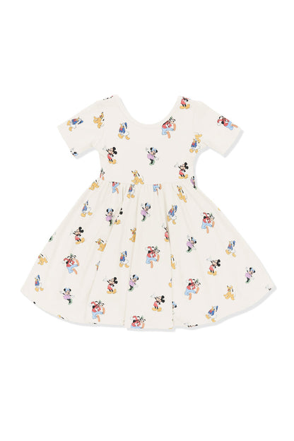 Twirl Dress with Mickey Mouse and Friends print on an oat background