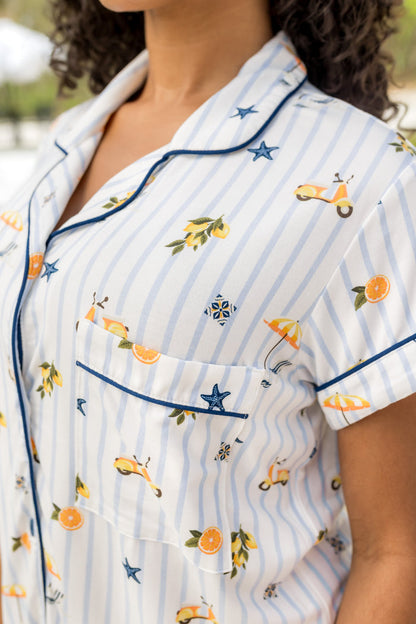 Close up of the chest pocket and dark blue trim on the Women's Short Sleeve Pajama Set in Amalfi Coast